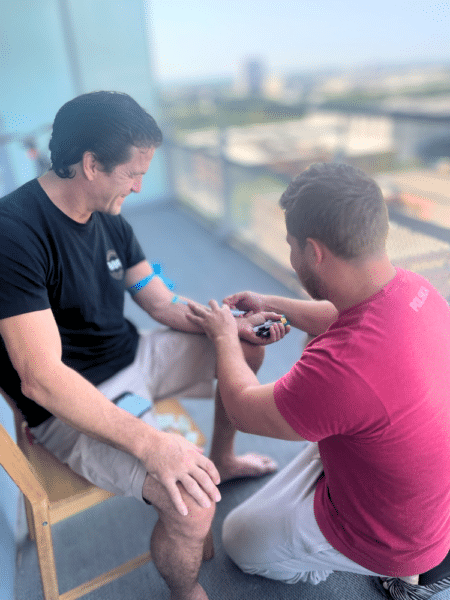 Dr. Peaches consulting with patient